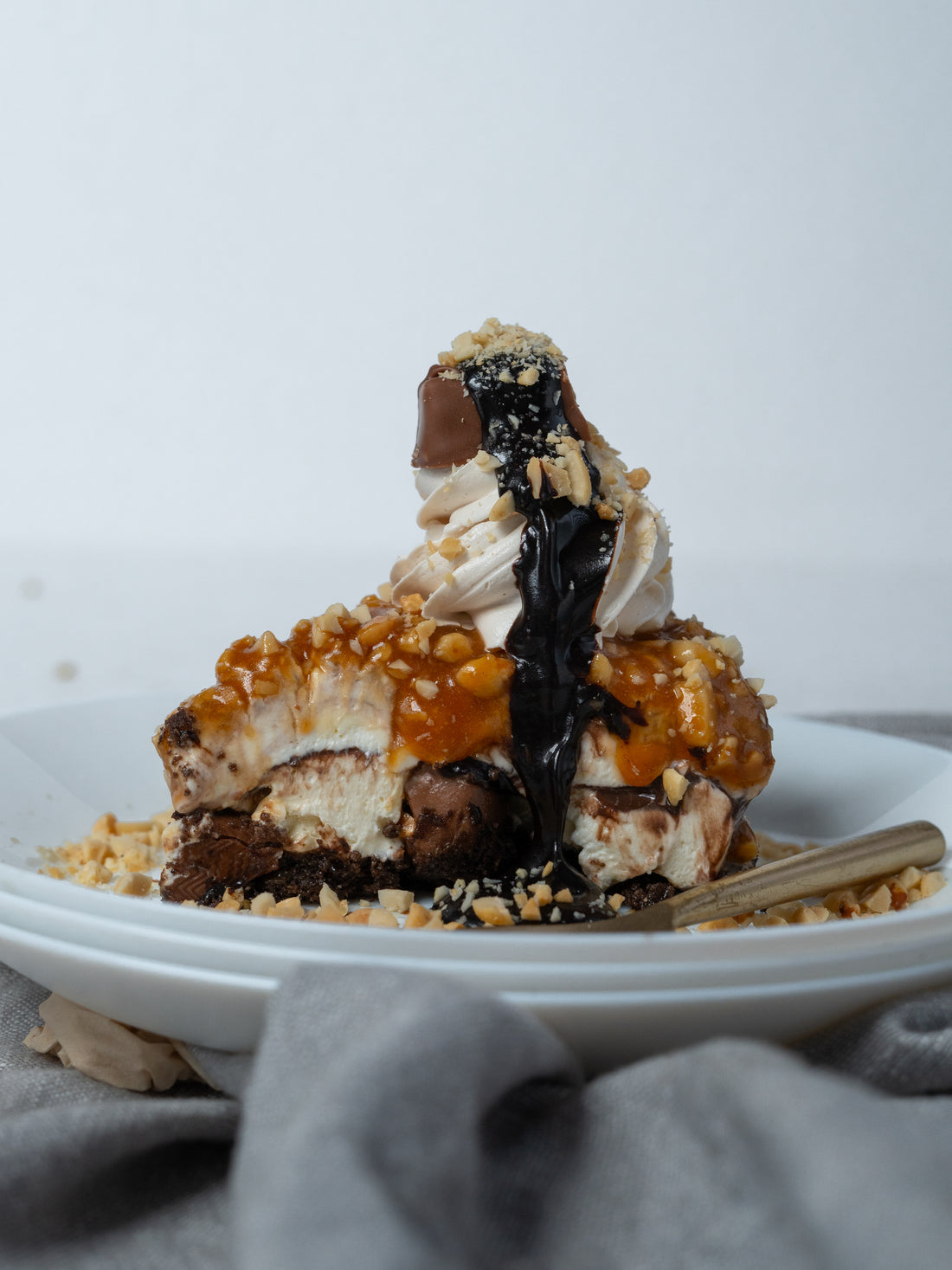 7- Layered Snickers Cheesecake